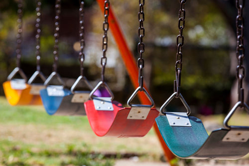 When Were Swings Invented? The History of Playground Equipment